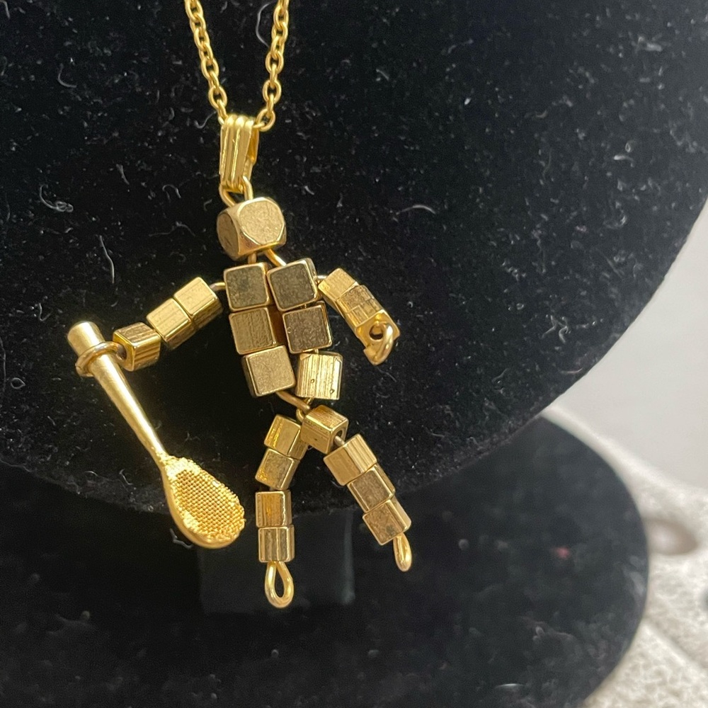 Tennis guy necklace